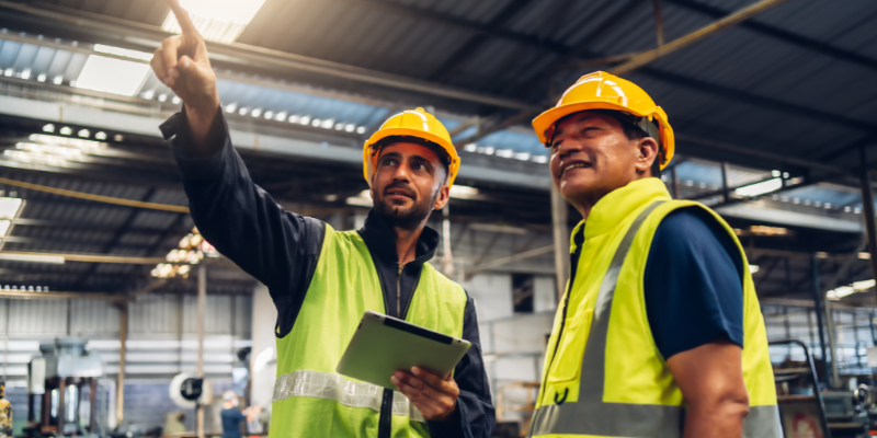 construction workers discussing project plans