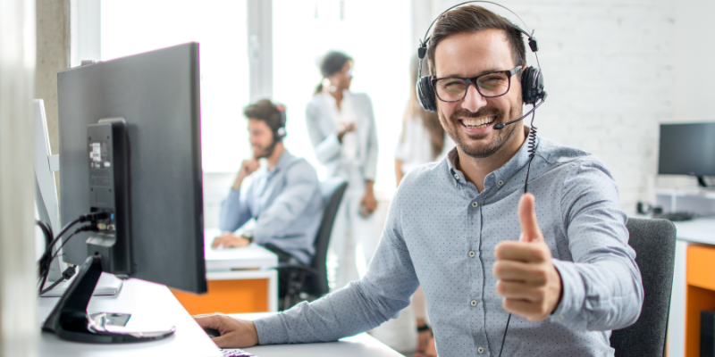 man happy working in the office
