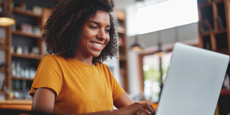 smiling woman working remotely